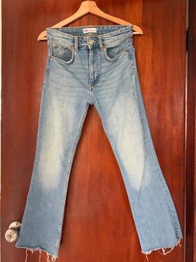Zara Light Blue Flared Mid-Rise Jeans - stretch denim